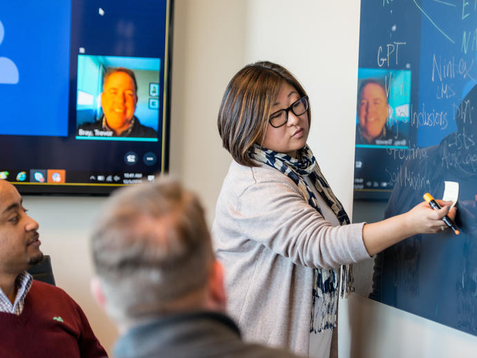 Employees from around the globe at a videoconference